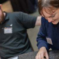 Two event attendees playing bingo